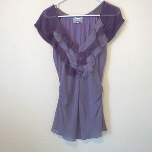Ruffled two tone purple top.